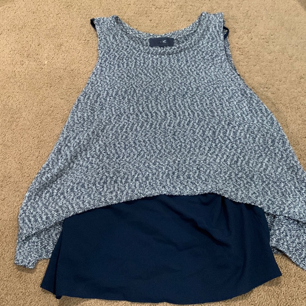 Blue and white sleeveless sweater